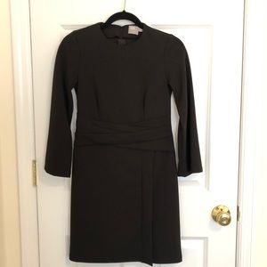 Long bell sleeve short black dress.